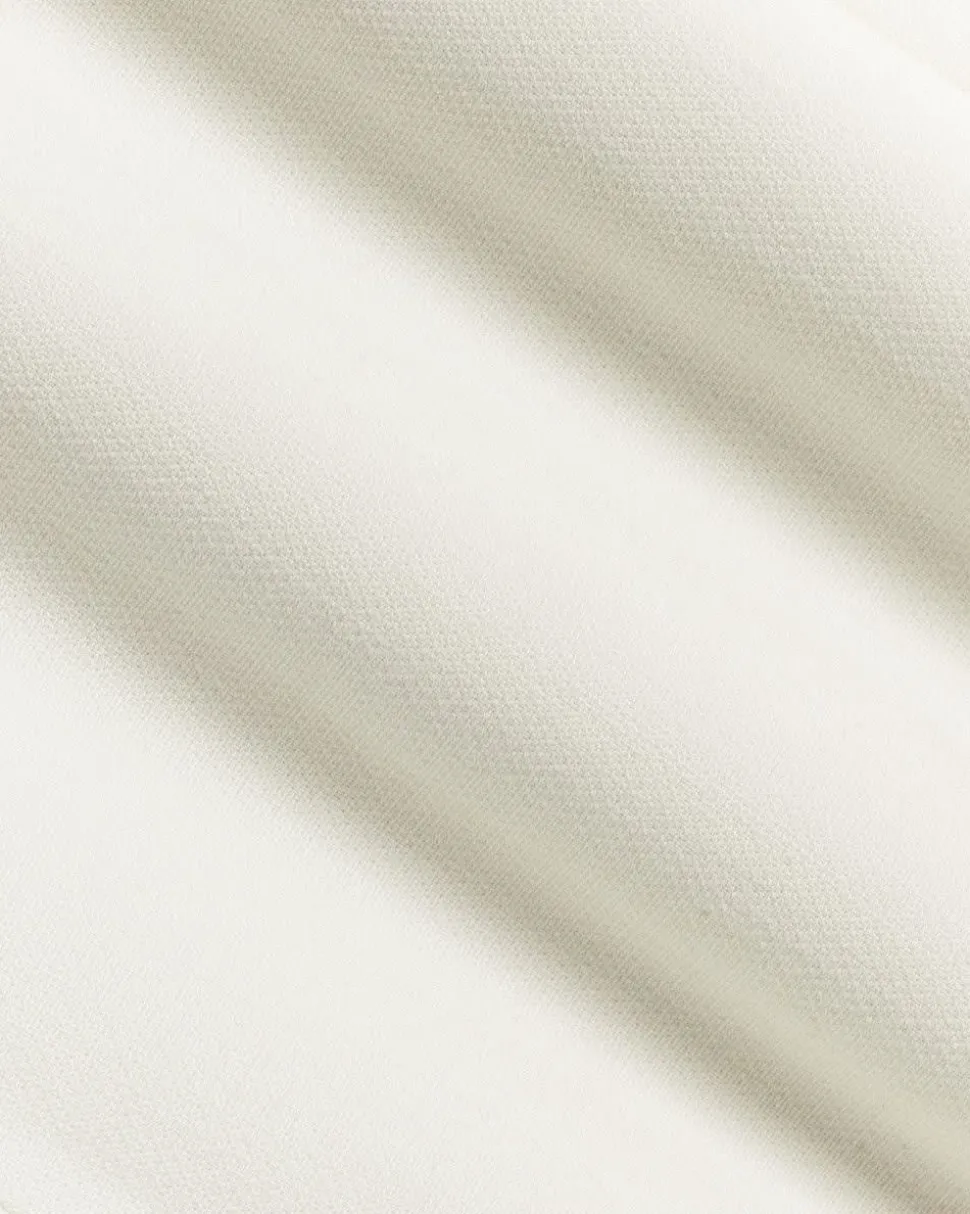 Crème Sleeveless Vest
