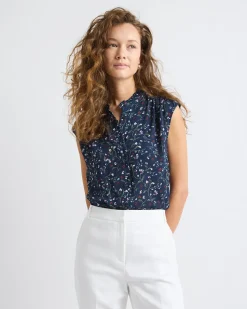 Sleeveless Mock-Neck Buttoned-Down Blouse with Ruffled Trim
