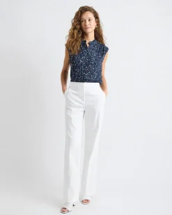 Sleeveless Mock-Neck Buttoned-Down Blouse with Ruffled Trim